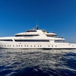 Liveaboard boat anchored near Daedalus Lighthouse, showcasing the three top liveaboard routes for diving the Deep South from Marsa Alam.